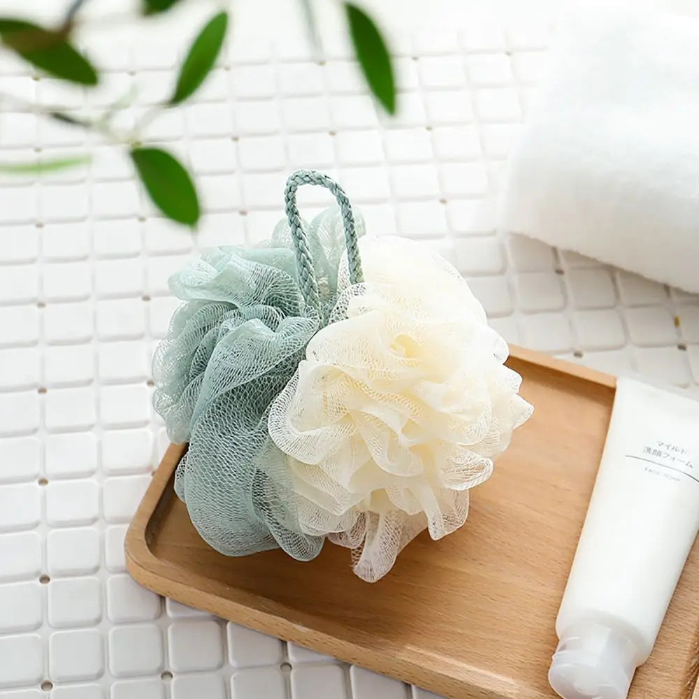 Éponge mousseuse en maille de douche douce